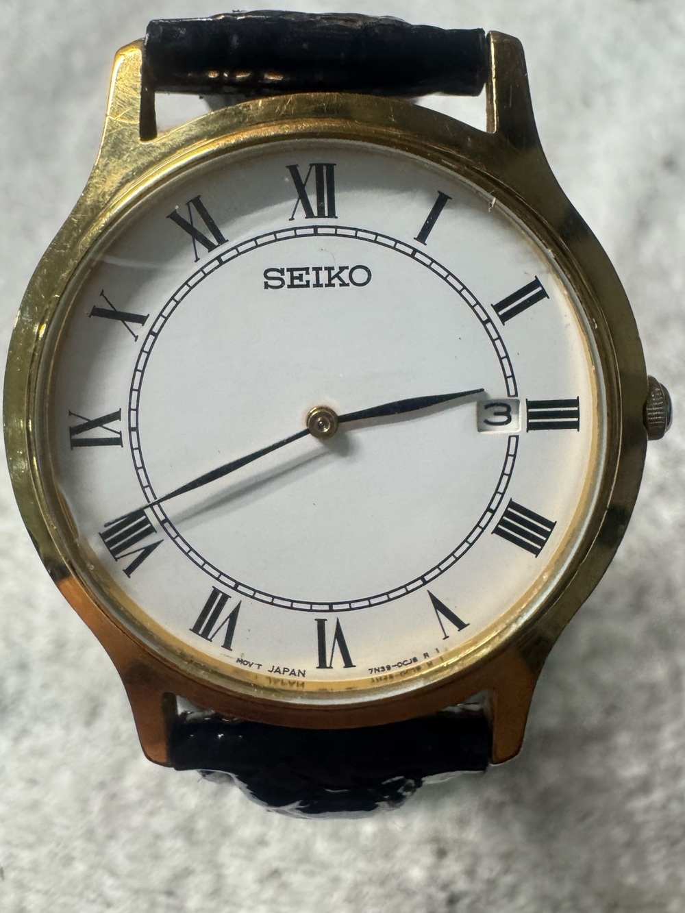 Seiko Gold-Tone Case White Dial Dress Watch with Black Roman Markers